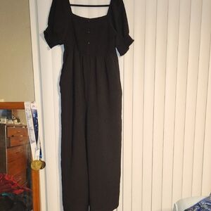 Black Short-Sleeved Long Romper With Pockets. Smocking On Top & Sleeves. SZ XL